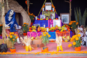 day of the dead, altar of the dead, altar, mary gold flowers,sugar skulls, traditional bread, paper decorations, incense, offering altar