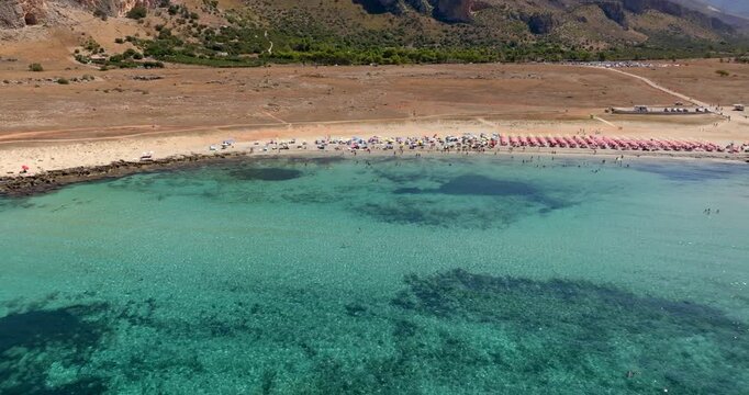 Aerial view of Macari Beach, located near San Vito Lo Capo, in province of Trapani, in Sicily, Italy. It is a beautiful coast with a turquoise and crystalline sea.