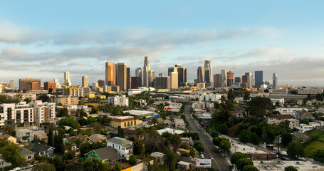 Fototapeta premium Los Angeles aerial panorama. LS city with architecture and blue sky. Drone photo of Los Angeles downtown skyline.