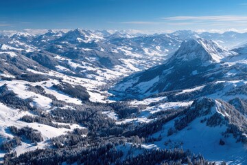 Obraz premium Aerial view of snow-covered mountains, valley