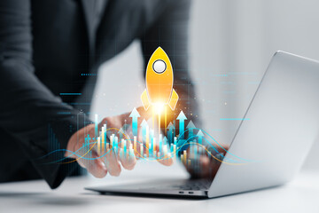 Startup business growth concept, businessman launching rocket icon over financial graph, business development, innovation, investment and financial success, digital transformation strategy.