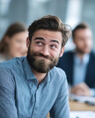 Obraz premium Businessman smiling nervously during a tense meeting, hiding discomfort behind polite professionalism.