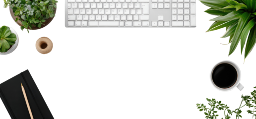 Flat lay of a workspace with a white keyboard, plants, a coffee cup, a notebook, and a pencil