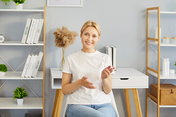 Video call meeting, online chat via webcam or webinar with happy woman talking with gestures....