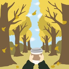 落ち葉が舞う並木道（イチョウ並木）でコーヒーやを持つ人物