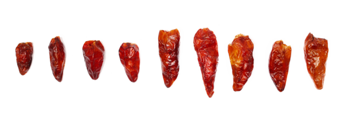 Set dried bird's eye chili peppers isolated on white background, top view