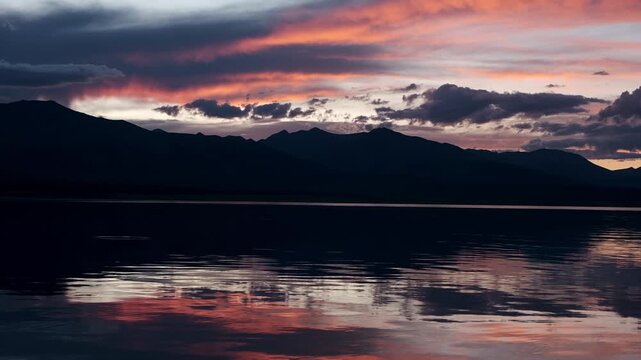 Mountain lake at sunset. Tourism and travel concept.