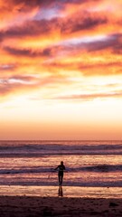 Surfer hitting the waves during sunset