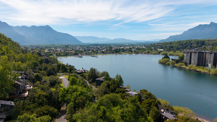 Aerial view of the city of Pucón, in southern Chile. The Villarrica Volcano can be seen in the background.