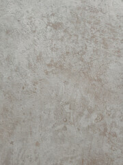 Textured light grey surface resembling modern concrete or an industrial finish, ideal for backgrounds, urban design, or material samples