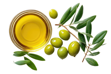 Olive oil in a bowl, surrounded by olives and leaves