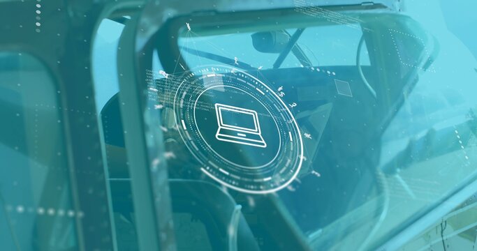 Displaying HUD with laptop icon inside helicopter cockpit, highlighting controls and seat harness - Powered by Adobe