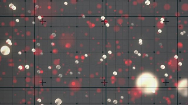 On start, red white dots drifting, pulsing across grey grid with plus markers for bokeh effect