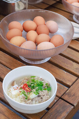 Hot Rice Porridge with Minced Pork and Egg