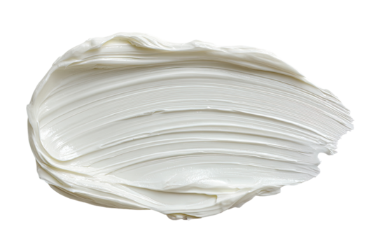 Creamy, off-white substance smudged in an oval shape, smooth texture