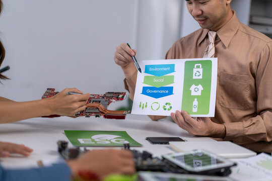 People discussing esg environmental social governance in meeting - Powered by Adobe