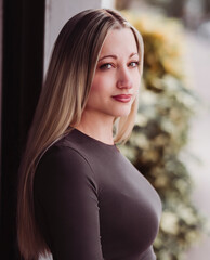 Portrait of a beautiful young woman with blonde hair