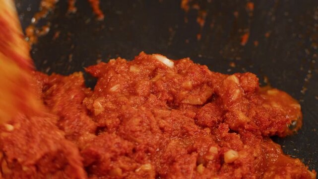 Tamarind red prawn curry cooking, shrimps in tomato ginger sauce, asian kitchen, Chinese restaurant.
