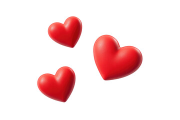 Three dimensional, glossy red hearts against a black background