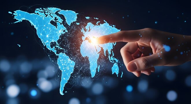 Human finger touching glowing blue digital world map with bright light on a dark background