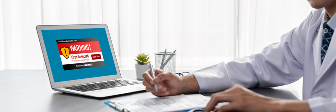 Virus warning alert on computer screen detected brisk cyber threat , hacker, computer virus and malware