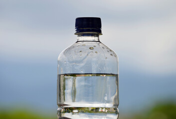 Bottle of water in a natural background