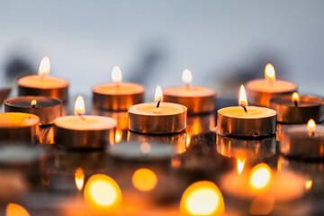 Abstract burning candles, festival of light, diwali wallpaper background.
