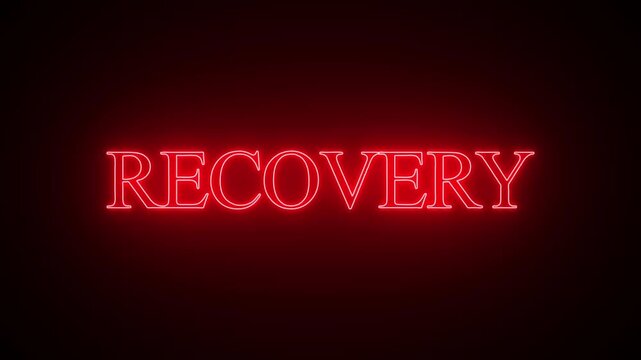 Red neon sign spelling out the word recovery