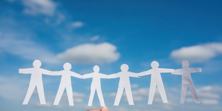 Inspiring Authentic Community Building and Human Connection Unified Paper People Chain Against Blue Sky for Modern Social Media Marketing Content
