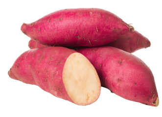 sweet potatoes stacked with cut sweet potato on white background.