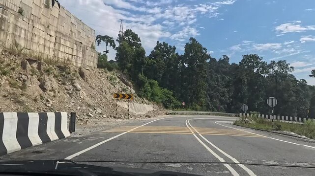 23.10.2025.Bagrakote West Bengal India  4k video clip of a road trip in a car as seen from driver point of view on a bright sunny day in India