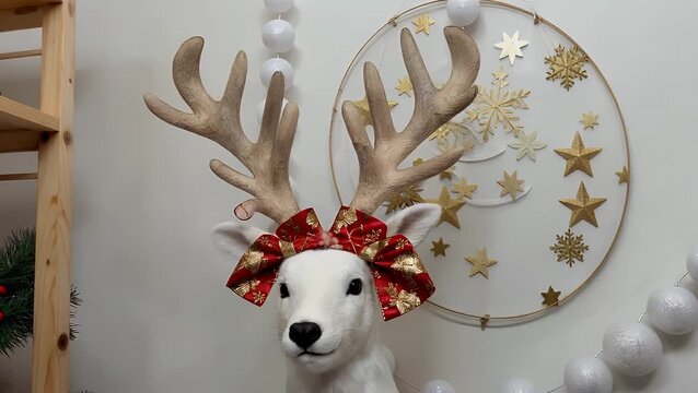 headwear designed to resemble the branched horns of a male deer  typically worn during winter holiday celebrations  isolated on a plain