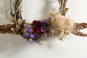 Boho dried flower wreath with fluffy natural accents, grapevine base, wall decor