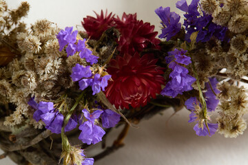 Boho dried flower wreath with fluffy natural accents, grapevine base, wall decor
