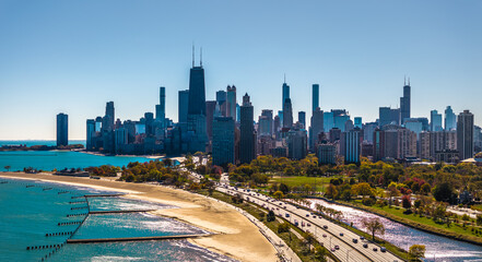  Aerial Drone View of Chicago Skyline and Lakeshore Drive Traffic | Wide Panoramic Cityscape Capture the stunning Chicago skyline from above with a wide panoramic aerial drone view, showcasing 