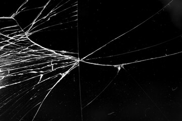 cracked glass isolated in black background