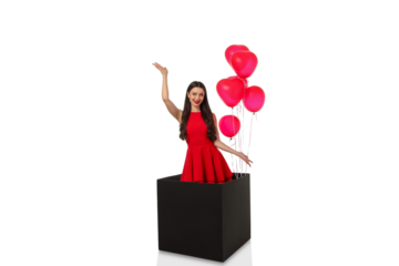 Woman in red dress holds red balloons in box, isolated, PNG