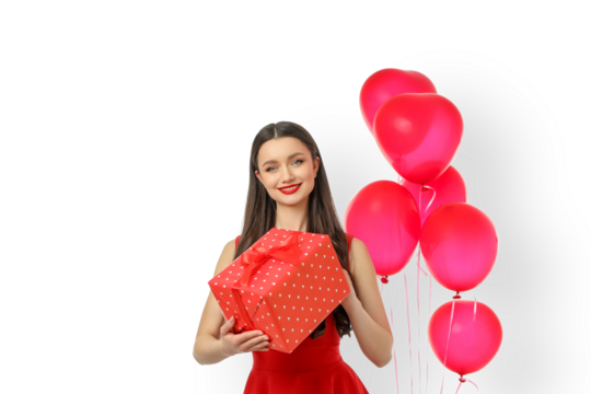 Woman in red dress holds a gift box with pink balloons, isolated, PNG