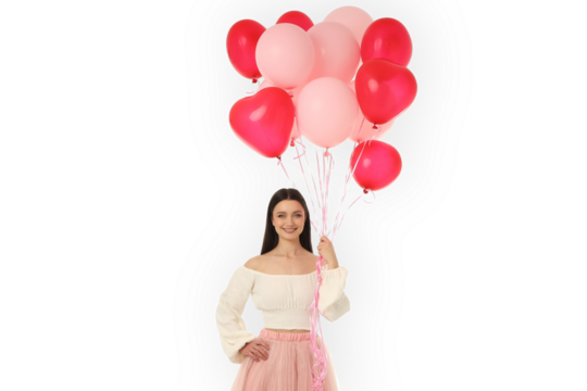 Woman stands smiling with pink and red balloons, isolated, PNG