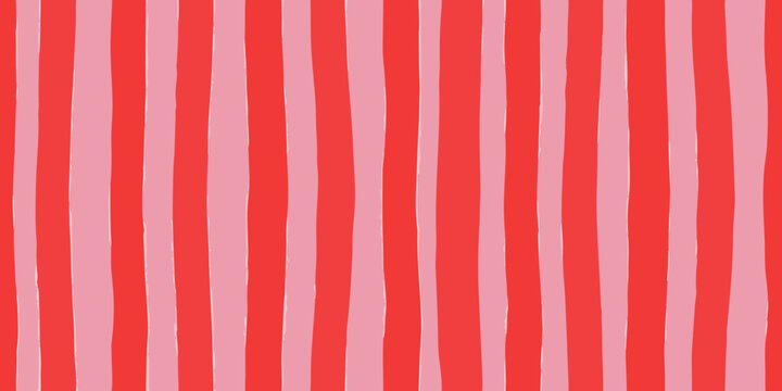 Hand drawn vertical stripes in bright red and soft pink colors abstract background