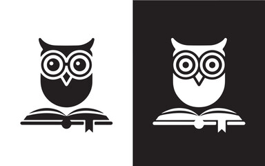 Obraz premium Owl reading a book a minimalist vector icon in black and white perfect for education and knowledge-related designs