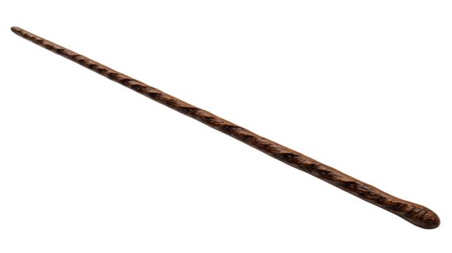 A long intricately carved dark wood wand or magical staff isolated against a plain black background