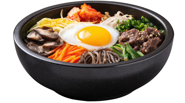 A traditional Korean stone bowl of bibimbap with a fried egg and a colorful array of fresh vegetables