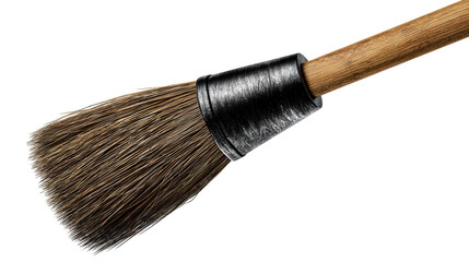 Fototapeta premium A traditional wooden handled paint brush with natural bristles and a metal ferrule rests against a dark surface