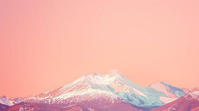 Majestic snow capped mountain peak bathed in soft pastel pink and orange sunset light
