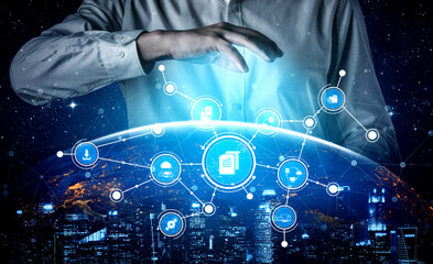 A person interacts with a futuristic interface displaying data visualizations over a globe, symbolizing global connections and advancements in technology. Tessel