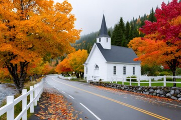 Rural church on an autumn road with vibrant fall foliage