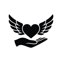 Obraz premium Black silhouette of a heart with wings resting on an open hand