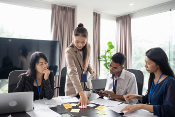 Business asian Multicultural businesspeople working project  working together in office conference ideas in startup at office Diversity leadership and business people