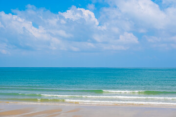 Nature of the ocean and blue sky Summer with sunshine, sandy beaches, clear blue waters sparkling...